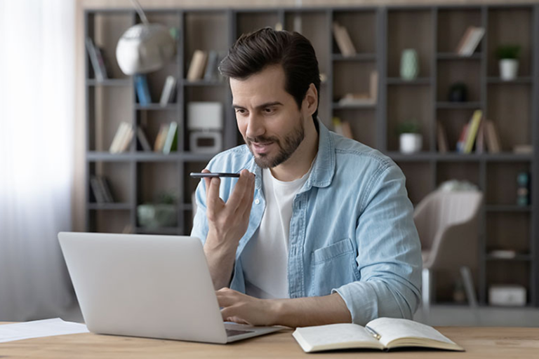Young professional using Philips SpeechLive for professional transcription and documentation