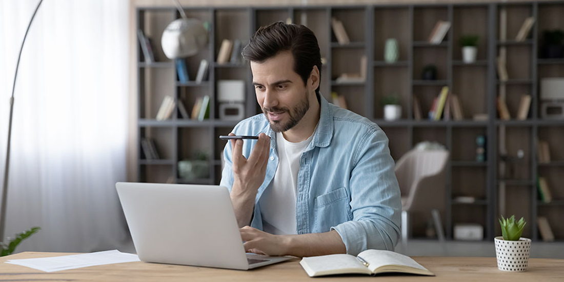 Young professional using Philips SpeechLive for professional transcription and documentation