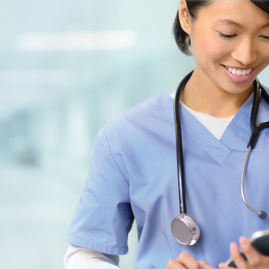 Doctor using Dragon Medical One for medical speech recognition and dictation